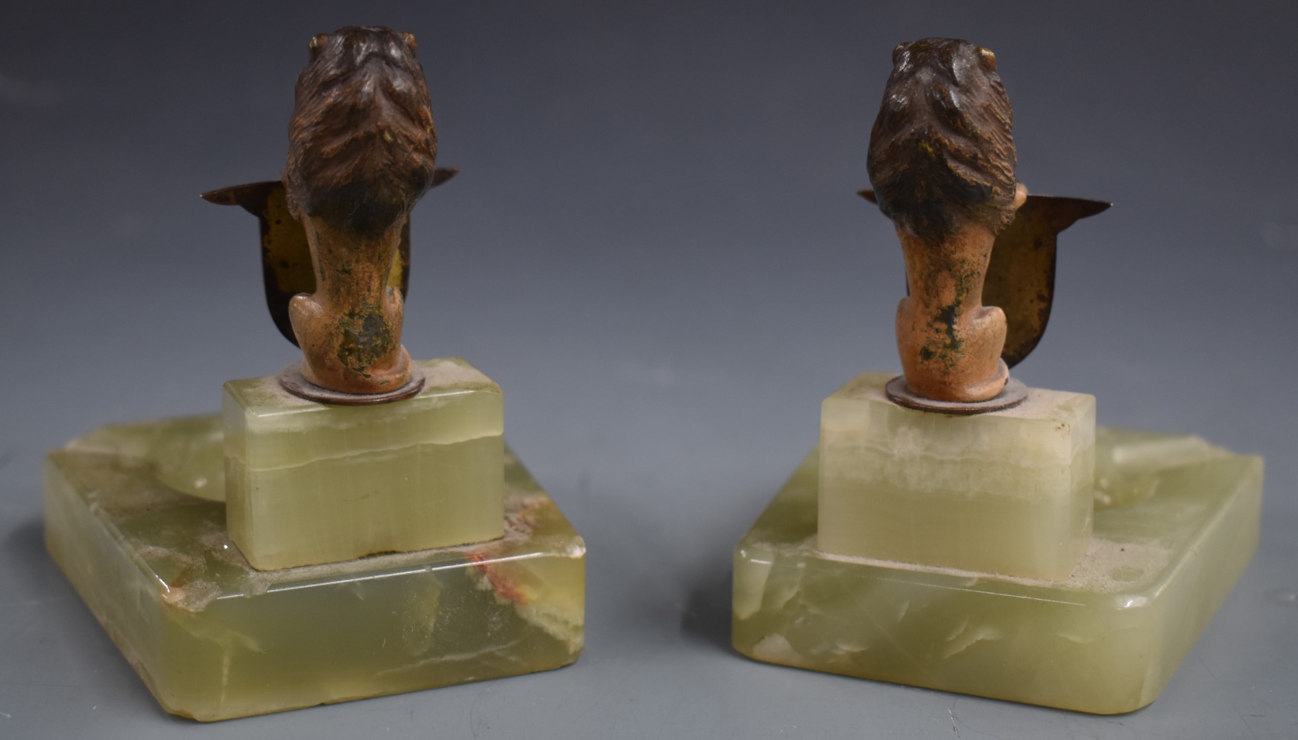 Pair of BARC Brooklands ashtrays, surmounted by cold painted bronze or similar lions holding - Image 2 of 3