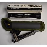 Bushmaster 8x56 rifle scope in original box together with a Greenkat 60mm spotting scope in
