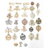 British Army small collection of Cavalry / Royal Armoured Corps metal badges including Dragoon and