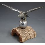 Desmo or similar car mascot formed as an eagle on a ball, wingspan 16.5cm