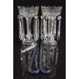 Pair of Victorian clear cut glass lustres 27cm tall and two Nailsea style blue glass canes, each