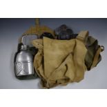 Quantity of Cold War military clothing and equipment including trousers, haversacks, mess tins,