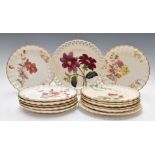 Set of twelve Copeland dessert plats decorated with botanical scenes and two similar Wedgwood ribbon