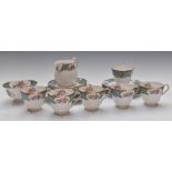 Twenty one pieces of Shelley tea ware decorated in the Blue Empress pattern, includes six trios.