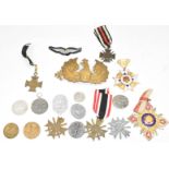 Small collection of German Nazi badges and medals