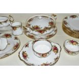 Approximately fifty six pieces of Royal Albert Old Country Roses dinner and tea ware including