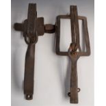 Two vintage large wrought iron animal traps, largest 49x18x12cm.