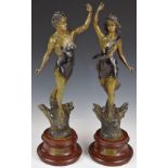 A pair of patinated spelter figures after Hippolyte Moreau 'Les Roses and Les Hirondelles' on
