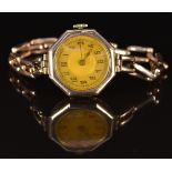 Unnamed 9ct gold ladies wristwatch with blued hands, black Arabic numerals, gold dial, octagonal