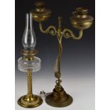 Twin branch brass oil lamp converted to electricity and a brass oil lamp, tallest 68cm