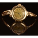 Unnamed 14ct gold ladies wristwatch with blued hands, black Arabic numerals, gold dial and