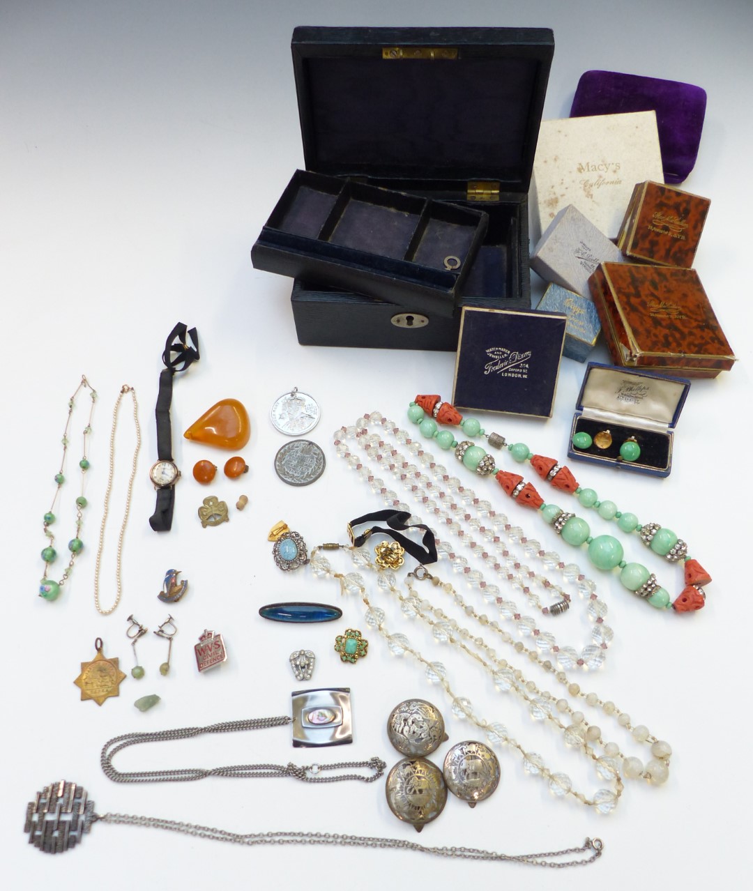 A collection of costume jewellery including silver brooch, Art Deco beaded necklace, 9ct gold J.W.