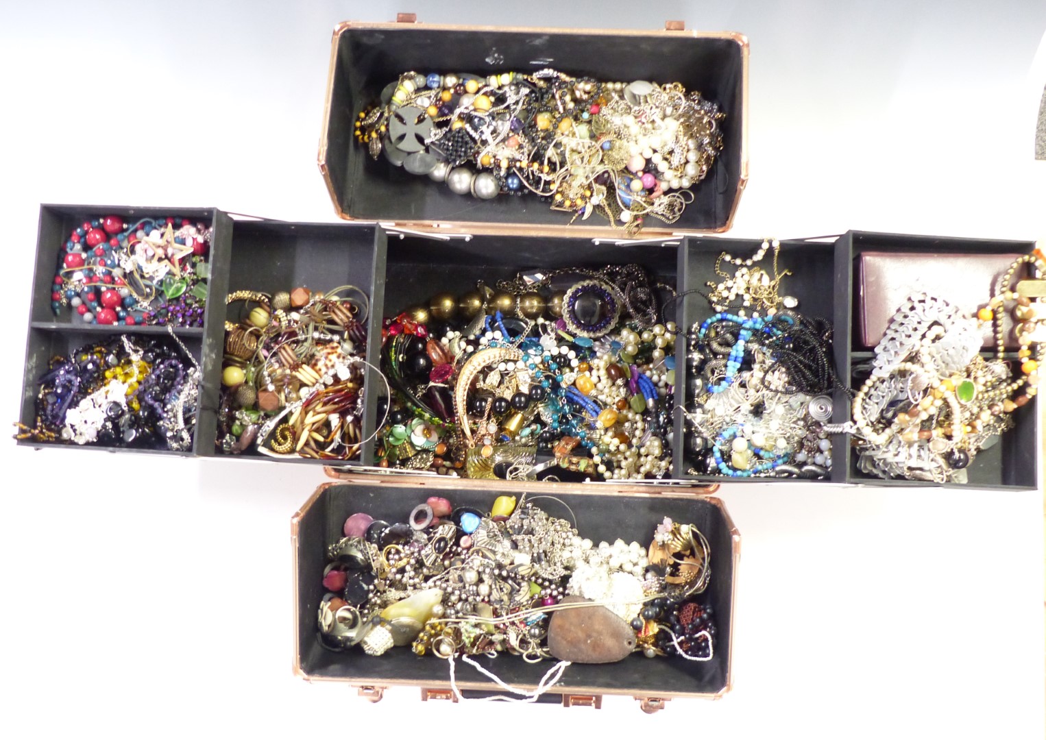 A collection of costume jewellery including vintage earrings and brooches, necklaces, etc