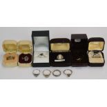 Seven silver rings, a 9ct gold ring (2g) and two other rings