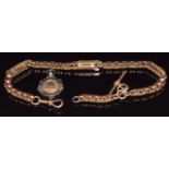 Victorian 9ct gold Albert chain made up of faceted and engraved links, 27.5g, with a silver fob