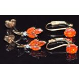 Two pairs of 9ct gold earrings, one set with fire opal the other fire opal and diamonds, 3.2g