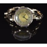 Unnamed 9ct gold ladies wristwatch with blued Breguet hands, black Arabic numerals, silver and