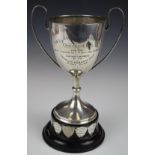 Hallmarked silver twin handled presentation cup 'The Llanedeyrn Farmers' best turned out pony and