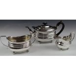 Georgian hallmarked silver three piece harlequin tea set with gadrooned edge and ribbed