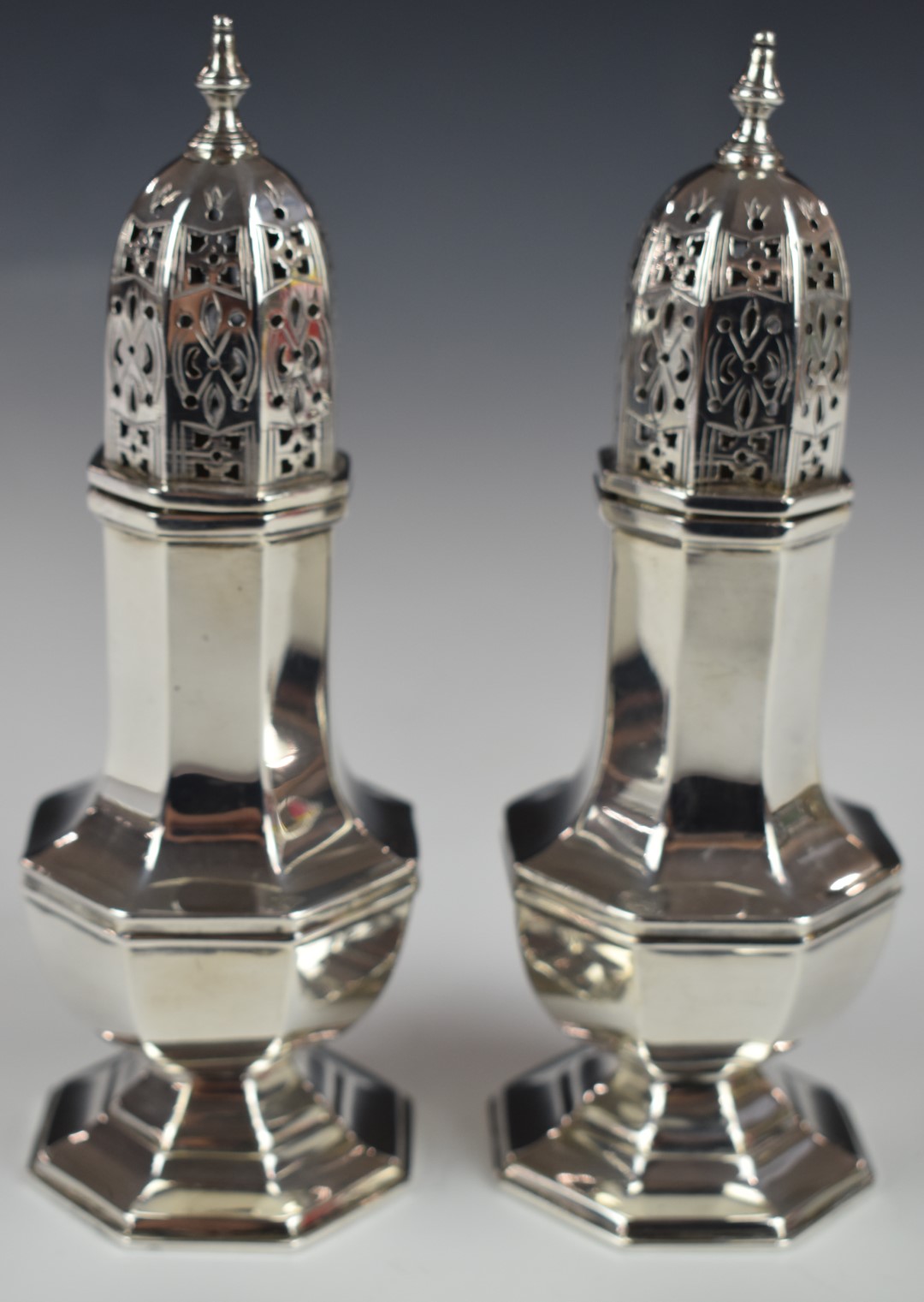 Pair of George V hallmarked silver sugar casters of octagonal baluster form, Sheffield 1935, maker - Image 2 of 5