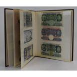 Collection of approximately seventy world banknotes in an album, to include Norman Fenwick-Warren