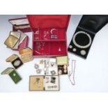 A collection of costume jewellery including silver mounts studs, Wedgwood stick pin, Miracle brooch,