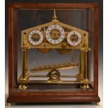 Devon Clocks Congreve rolling ball clock, the three enamelled chapter rings with Arabic numerals,