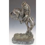 A large bronze mounted figure 'The Outlaw', impressed 'Frederic Remington' (American 1861-1909),