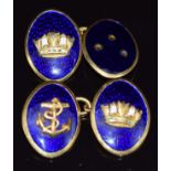 A pair of 18ct gold cufflinks set with blue enamel with anchor and crown decoration, 11.8g