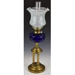 19thC blue glass oil lamp with triple reeded column support and frilled opaque glass shade, H66cm