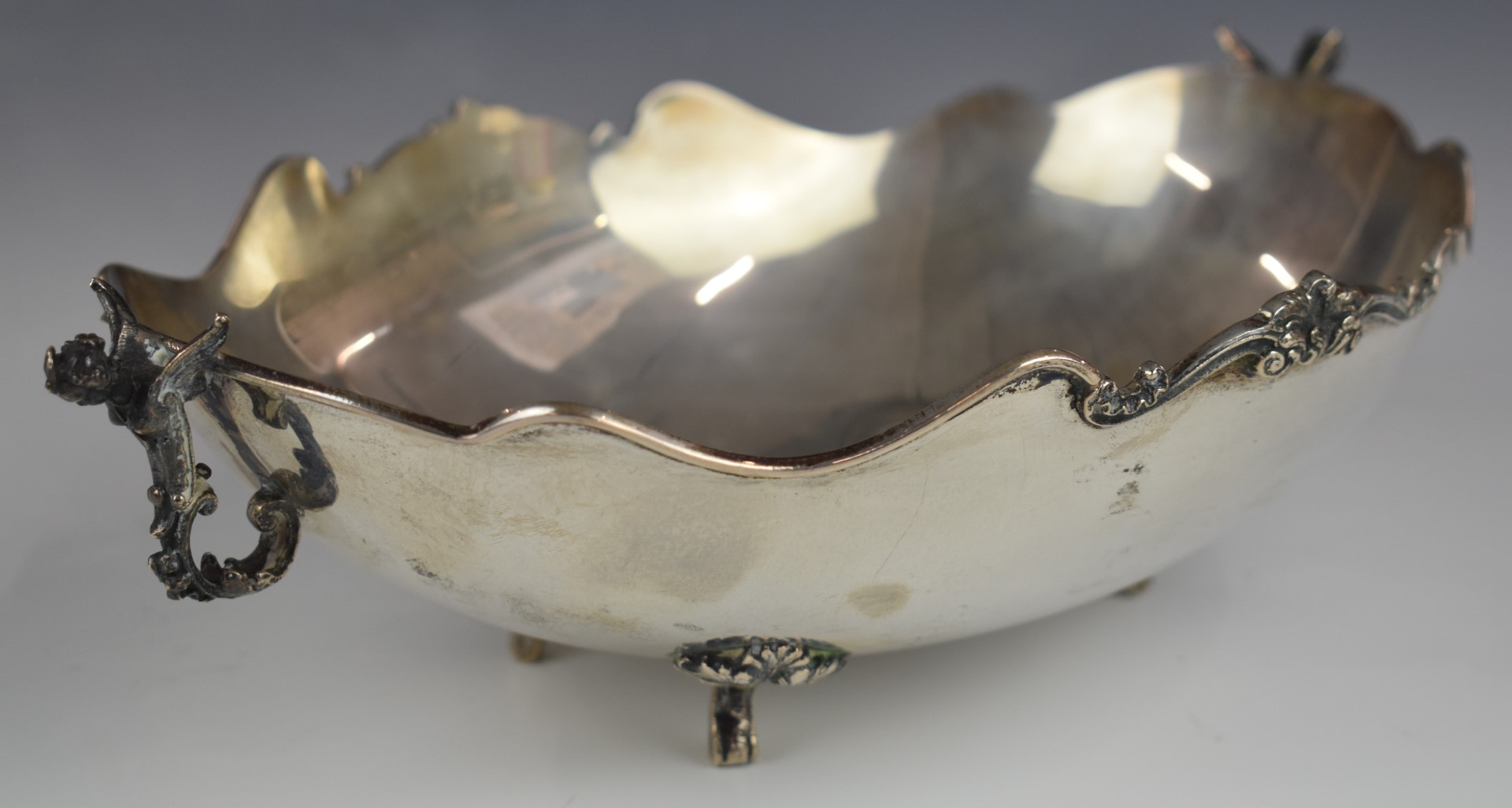 Continental white metal oval bowl with winged cherub handles, raised on four feet, marked 800 to - Image 3 of 3