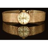 Omega 9ct gold ladies automatic wristwatch with date aperture, gold hands, baton hour markers,