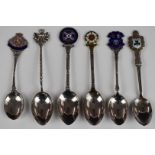 Six hallmarked silver souvenir spoons, most having enamel decoration, to include Llandudno,