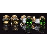 A pair of 9ct gold earrings set with tourmaline and a pair of 9ct gold earrings set with diopside