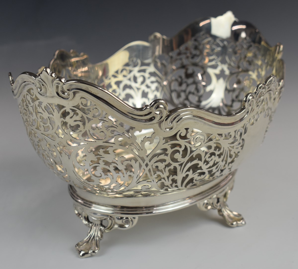 George V hallmarked silver oval bowl with pierced decoration, raised on four feet, Sheffield 1928, - Image 2 of 3