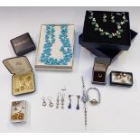 A collection of jewellery including silver ring, necklace, silver earrings, watches etc.