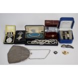 A collection of costume jewellery including silver purse, pearl necklace etc