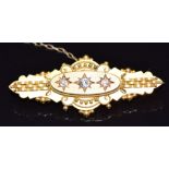 Victorian 15ct gold brooch set with three old cut diamonds in star settings, Birmingham 1896, 4.4g