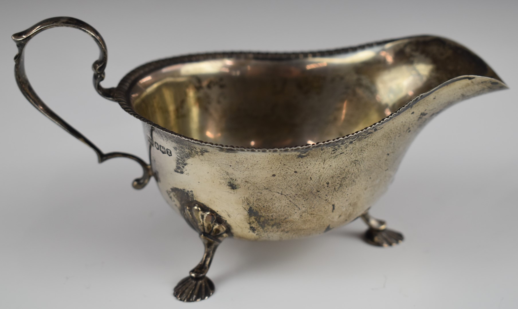 George VI Mappin & Webb hallmarked silver sauce boat with gadrooned edge, raised on three feet, - Image 2 of 4