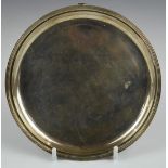 George VI hallmarked silver circular card tray, raised on three feet, London 1939, maker Edward