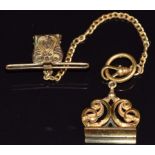 A rolled gold fob chain and seal