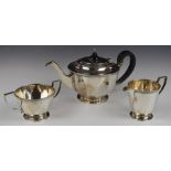 Mappin & Webb George V hallmarked silver three piece tea set with Arts & Crafts style hammered