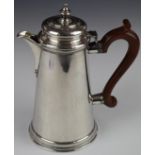 Elizabeth II hallmarked silver hot water jug of plain tapering form, London 1962, maker C J Vander