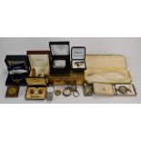 A collection of costume jewellery including two silver fob watches, faux pearls, £2 coin, watches