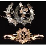 Edwardian 9ct gold brooch (1.8g) and a Victorian silver brooch in the form of two horseshoes with