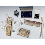 A collection of costume jewellery including faux pearls, diamanté necklace, silver brooch,