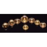 Two 9ct gold studs (2.4g), two 18ct gold studs (1.8g) and four 15ct gold studs (3.7g)