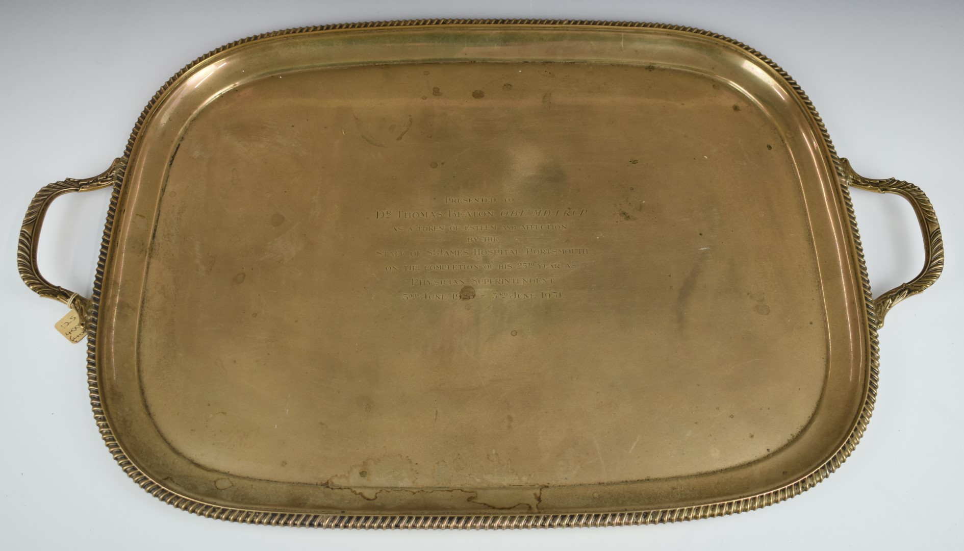 Large George V hallmarked silver twin handled tray with gadrooned edge, with St. James Hospital