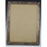 Large silver photograph frame to suit 11 x 8 inch photo, marked sterling, with easel back