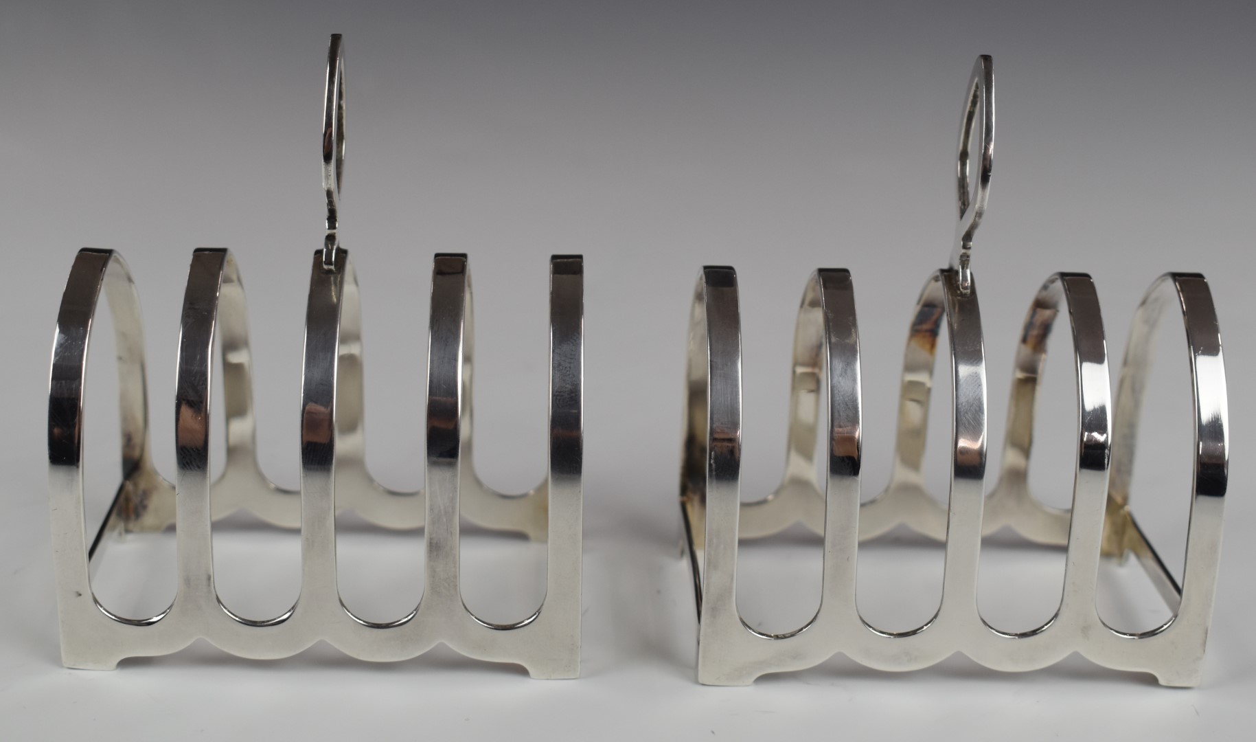 Pair of Elizabeth II hallmarked silver five bar toast racks, Birmingham 1960, maker William Suckling - Image 2 of 4